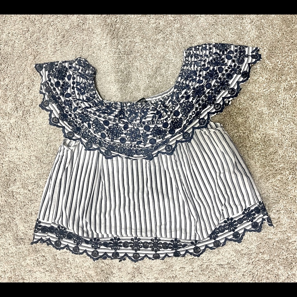 Navy and white top.  Off shoulder or on.